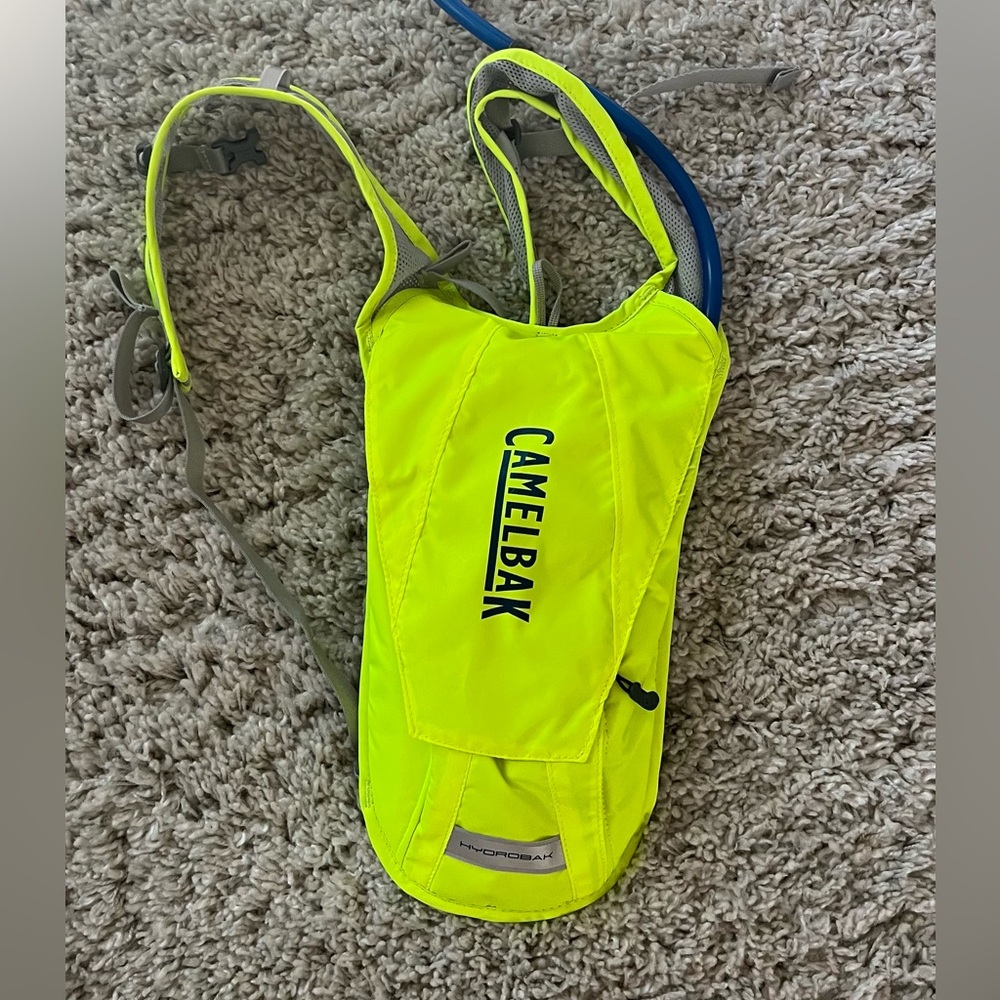 Brand New!! CamelBak Hydrobak hydration backpack fluorescent yellow. Never used.